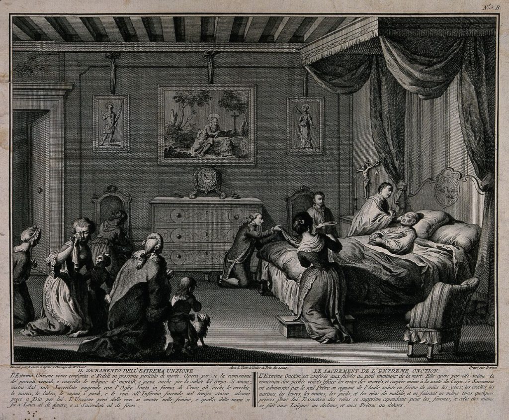 A priest administering the anointing of the sick.