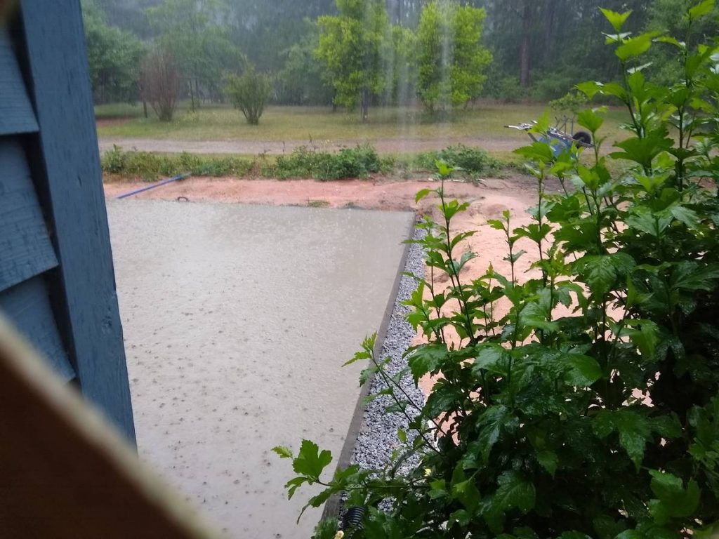 Rain pouring on concrete. 